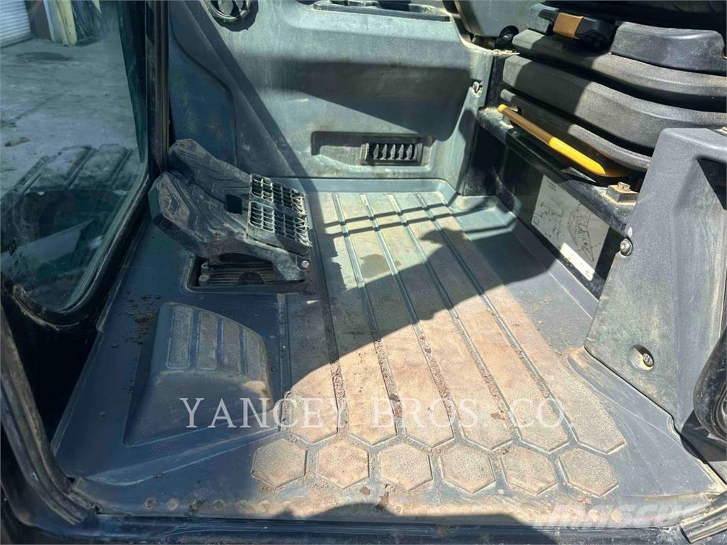 CAT 310 Rupsgraafmachines