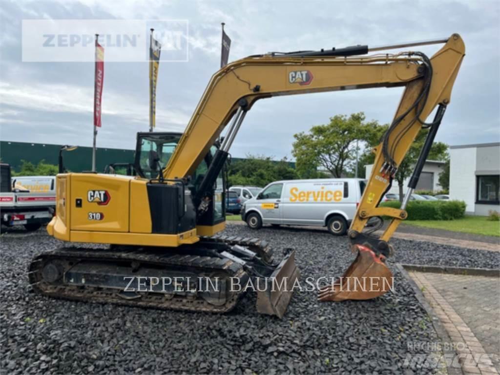 CAT 310 Rupsgraafmachines