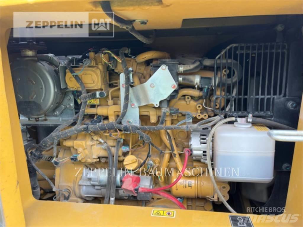 CAT 310 Rupsgraafmachines