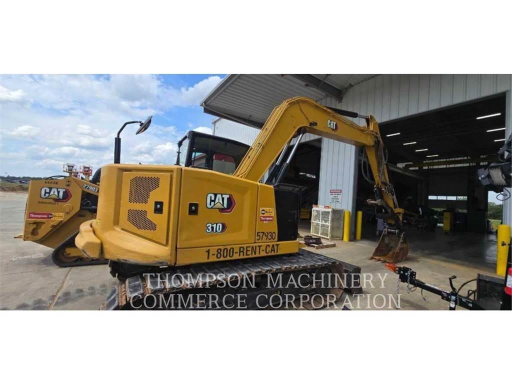 CAT 310 Rupsgraafmachines