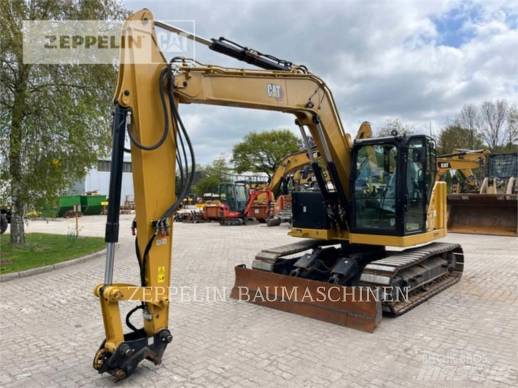 CAT 310 Rupsgraafmachines