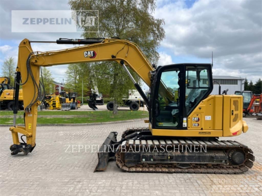 CAT 310 Rupsgraafmachines