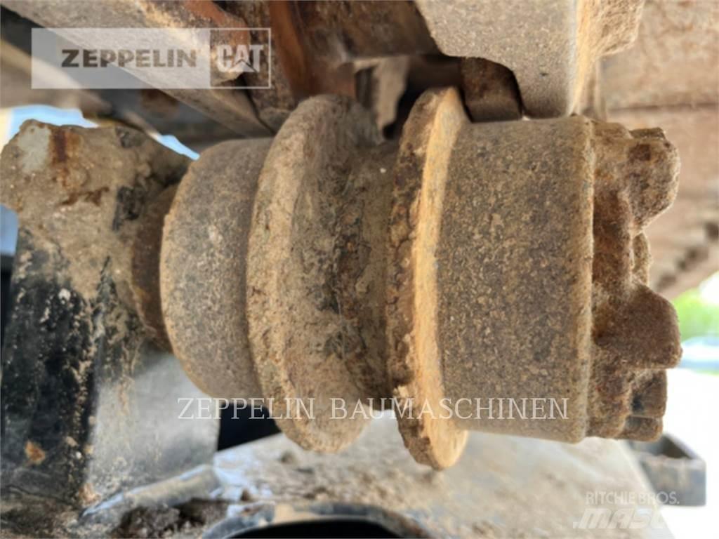 CAT 310 Rupsgraafmachines