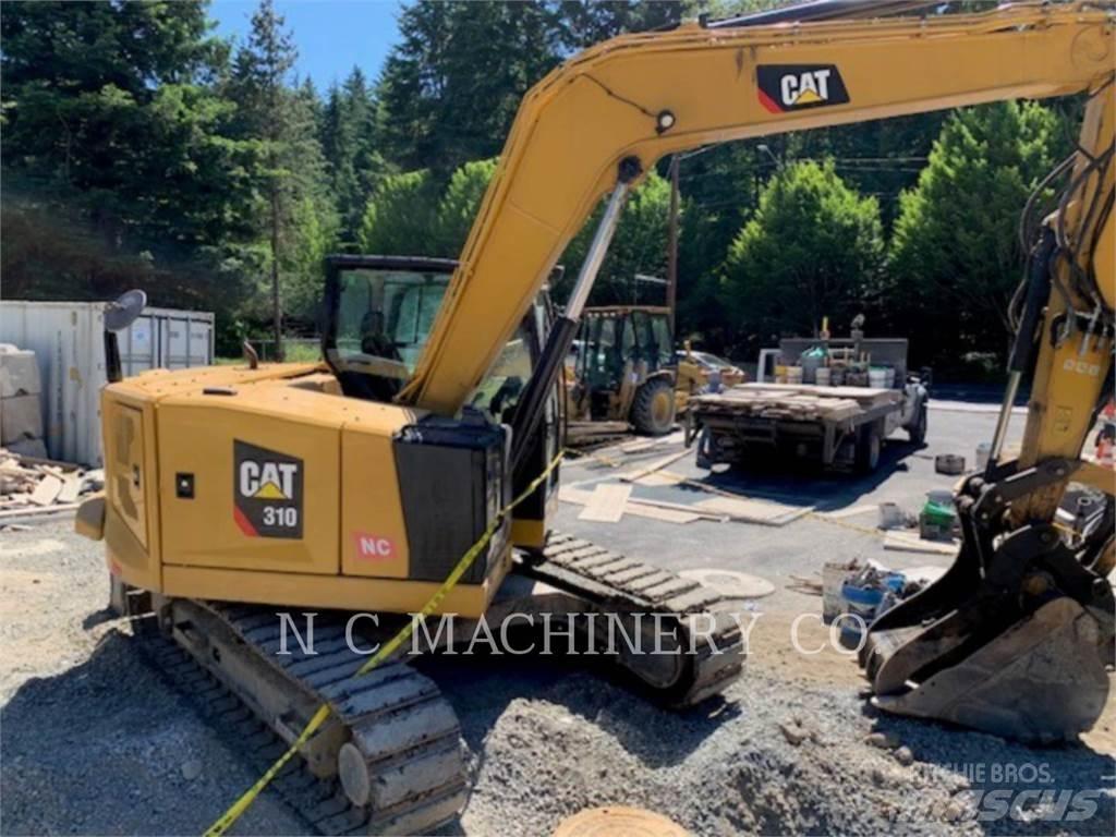 CAT 310 Rupsgraafmachines