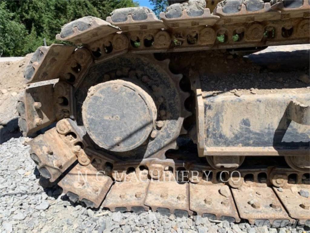 CAT 310 Rupsgraafmachines
