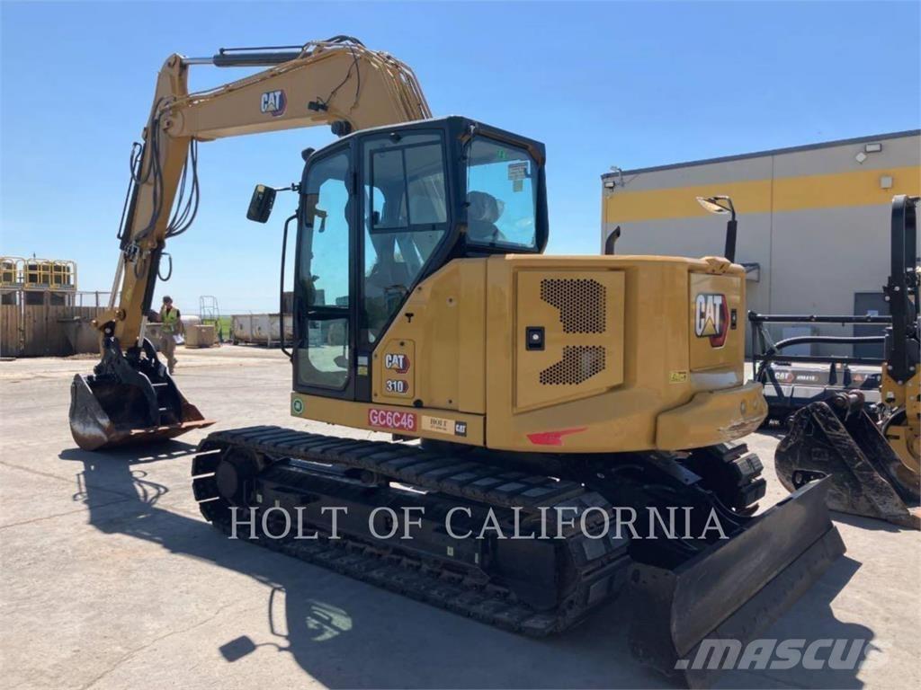 CAT 310 Rupsgraafmachines