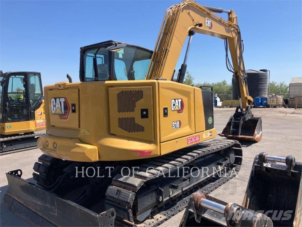 CAT 310 Rupsgraafmachines