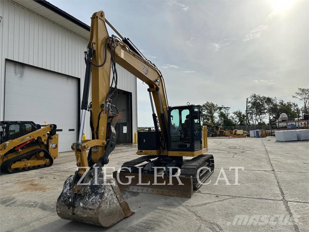 CAT 310 Rupsgraafmachines