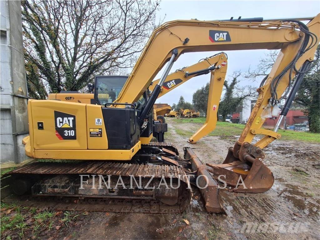 CAT 310 Rupsgraafmachines