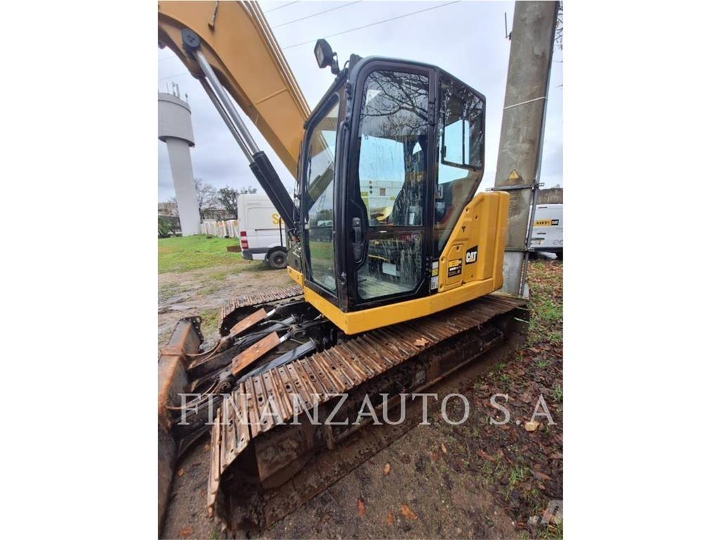 CAT 310 Rupsgraafmachines
