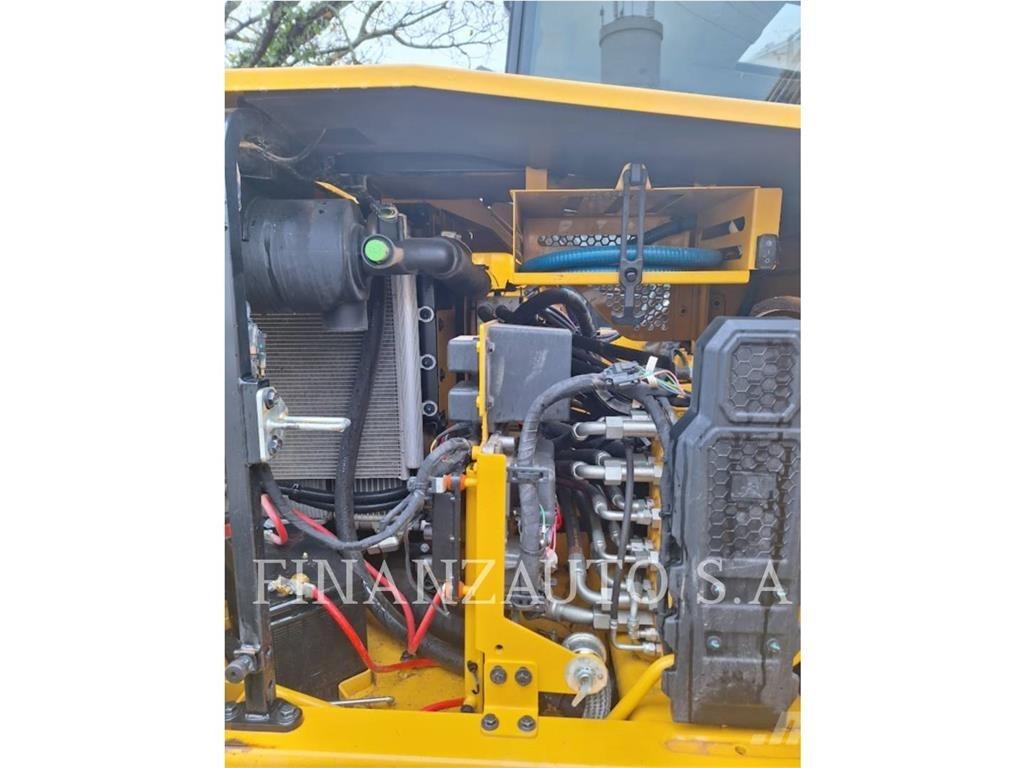 CAT 310 Rupsgraafmachines