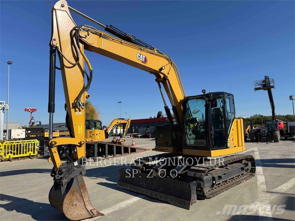 CAT 310 Rupsgraafmachines