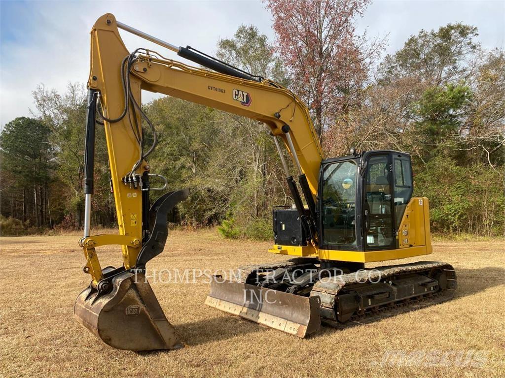 CAT 310 Rupsgraafmachines