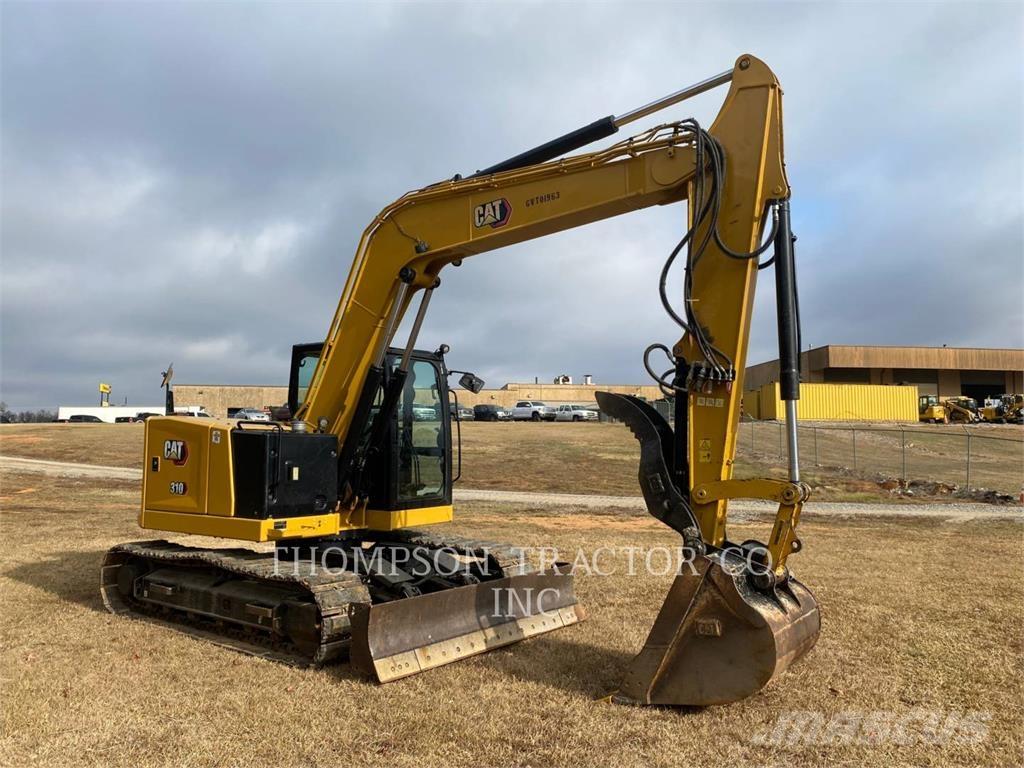 CAT 310 Rupsgraafmachines