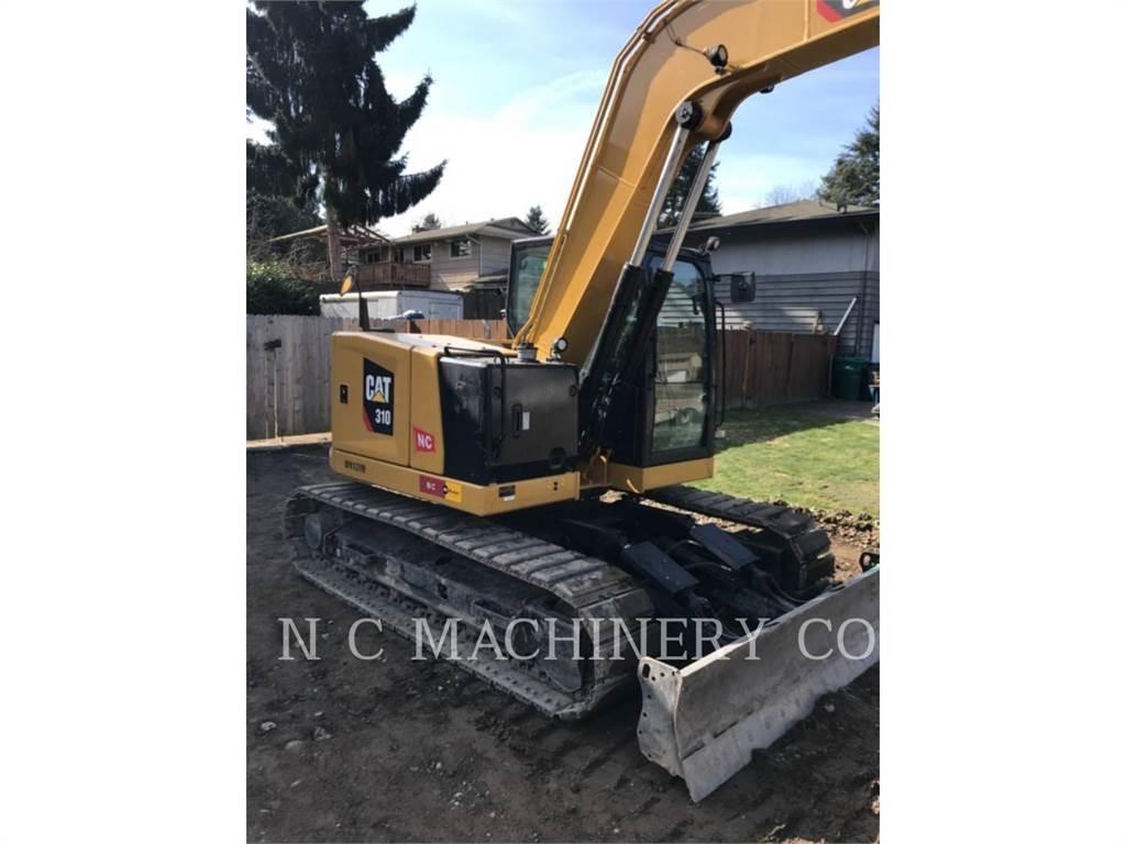 CAT 310 Rupsgraafmachines
