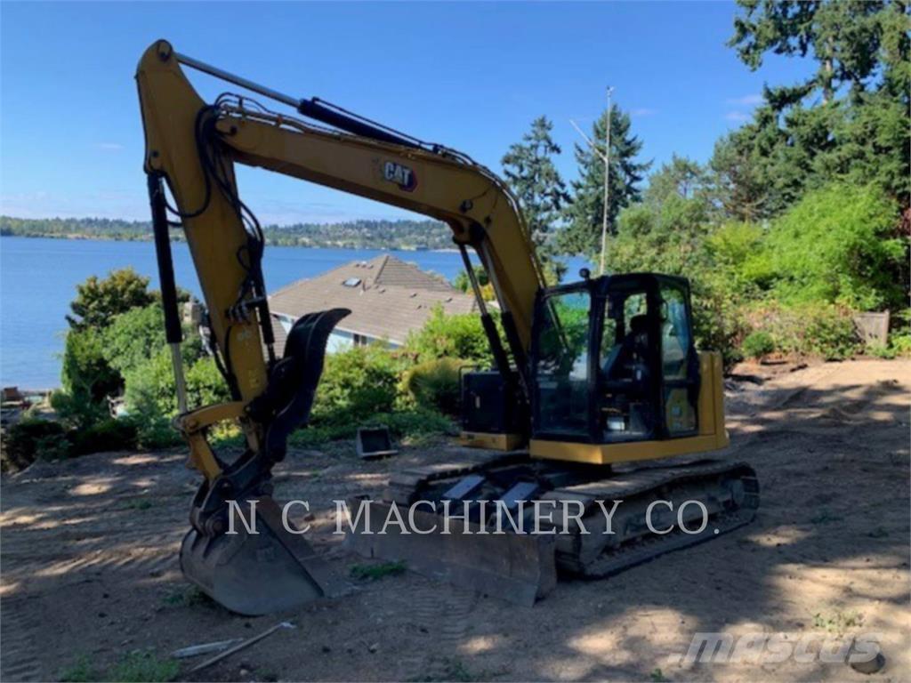 CAT 310 Rupsgraafmachines