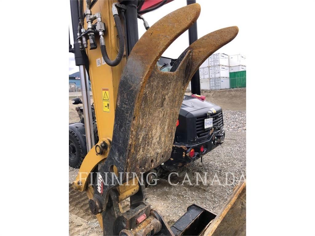 CAT 310-07 Rupsgraafmachines