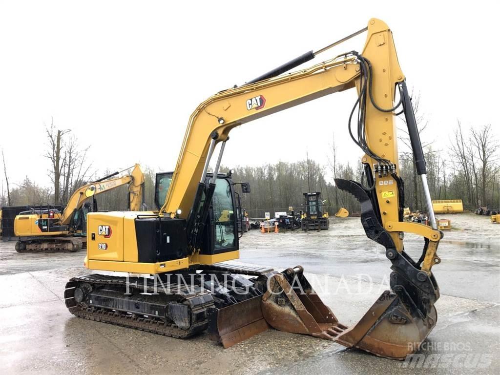 CAT 310-07 Rupsgraafmachines