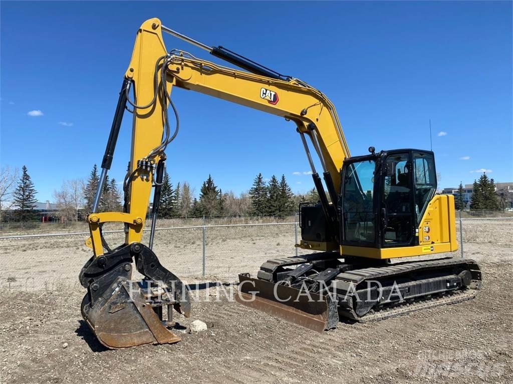 CAT 310-07 Rupsgraafmachines