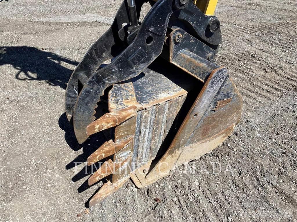 CAT 310-07 Rupsgraafmachines