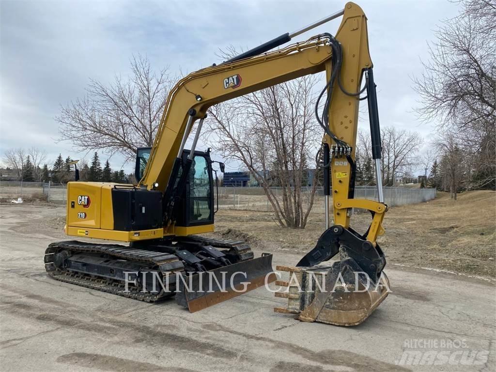 CAT 310-07 Rupsgraafmachines