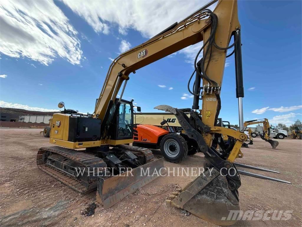 CAT 310 TH Rupsgraafmachines