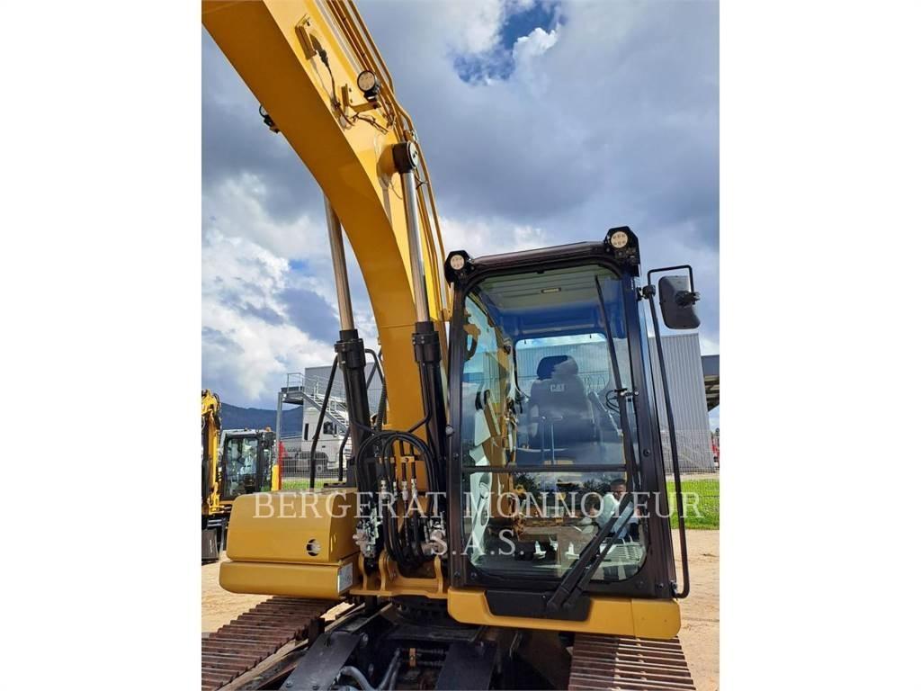 CAT 313 Rupsgraafmachines