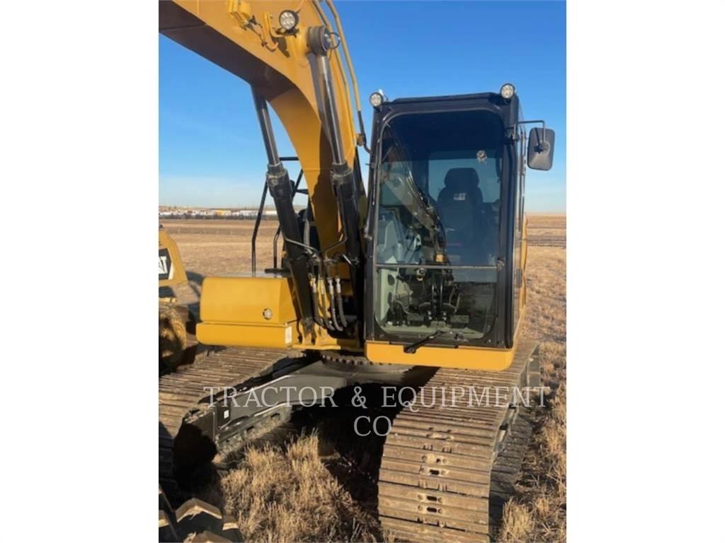 CAT 313 Rupsgraafmachines