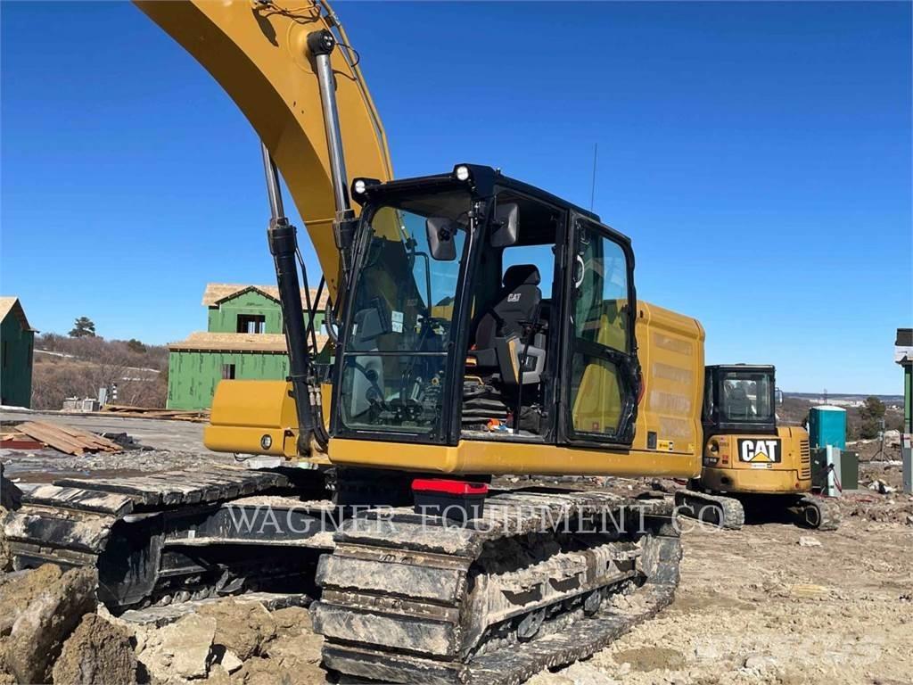 CAT 323 Rupsgraafmachines