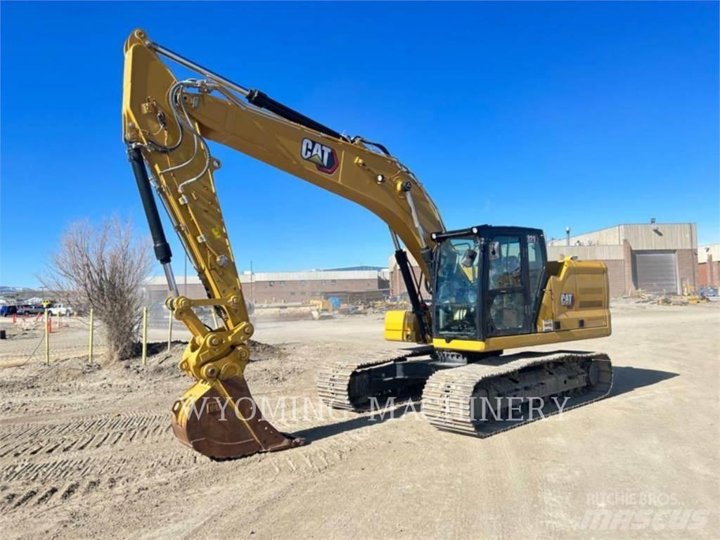 CAT 323 Rupsgraafmachines