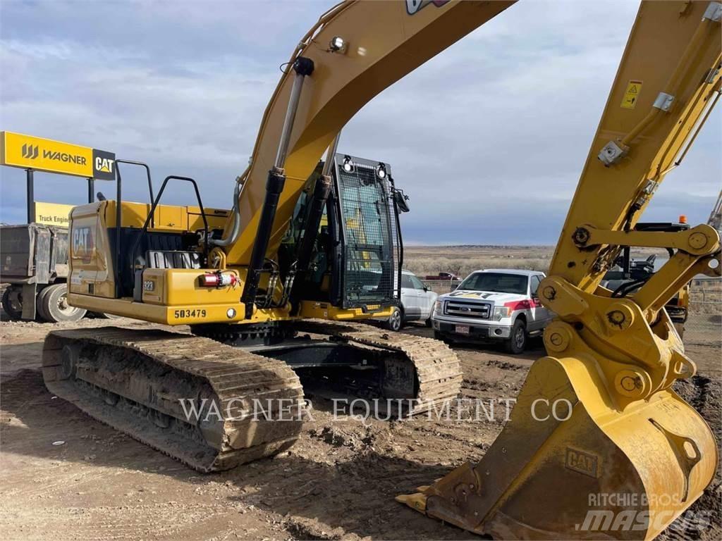 CAT 323 Rupsgraafmachines