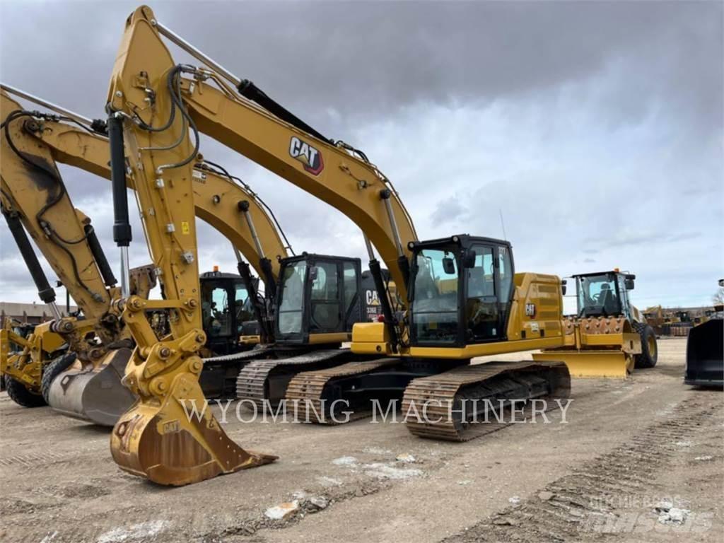 CAT 323 Rupsgraafmachines