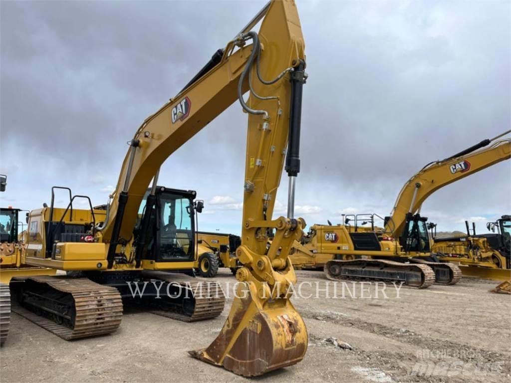 CAT 323 Rupsgraafmachines