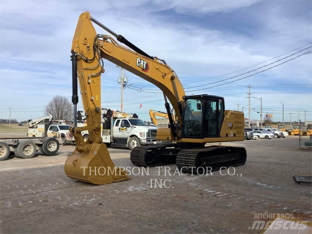 CAT 323 Rupsgraafmachines