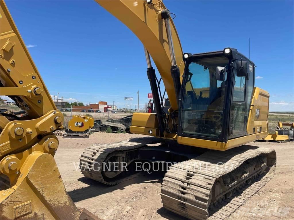 CAT 323 Rupsgraafmachines