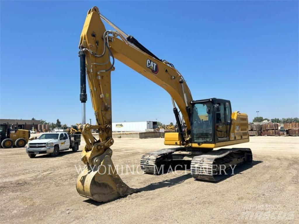 CAT 323 Rupsgraafmachines