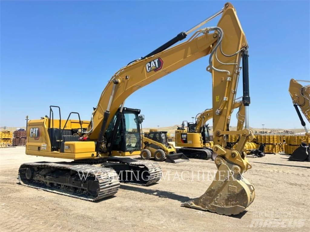 CAT 323 Rupsgraafmachines