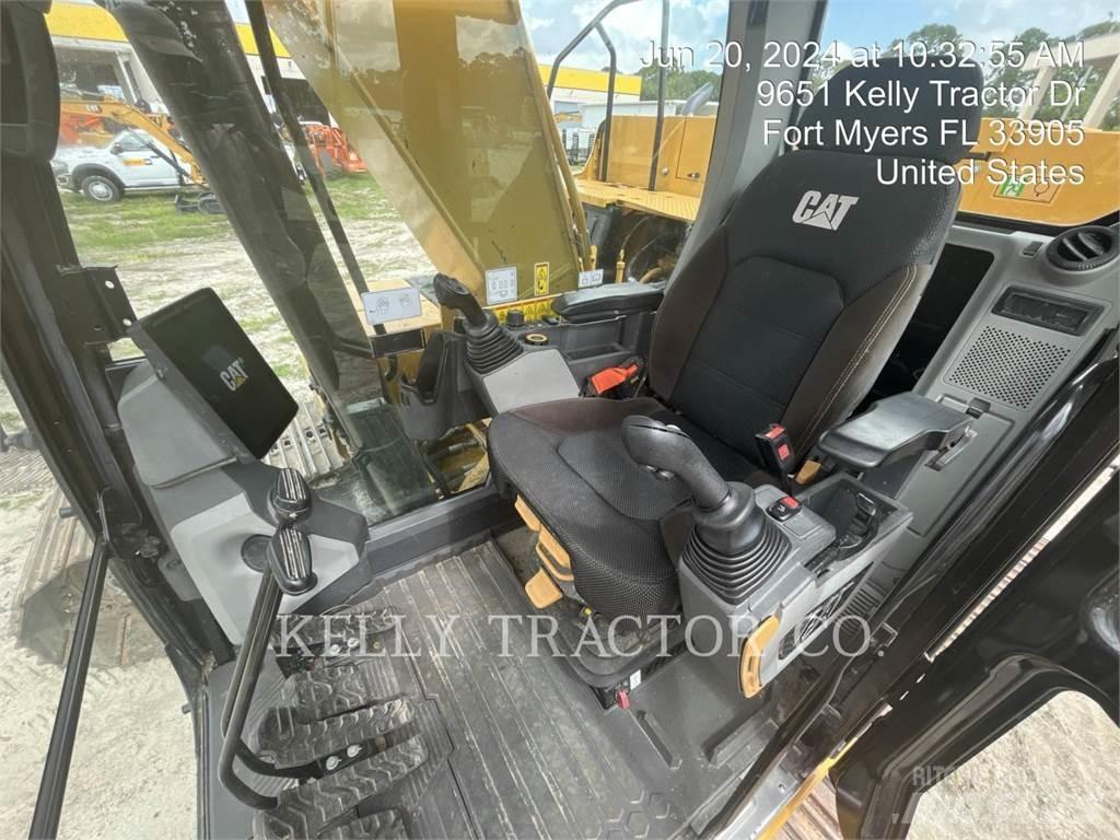 CAT 323 Rupsgraafmachines