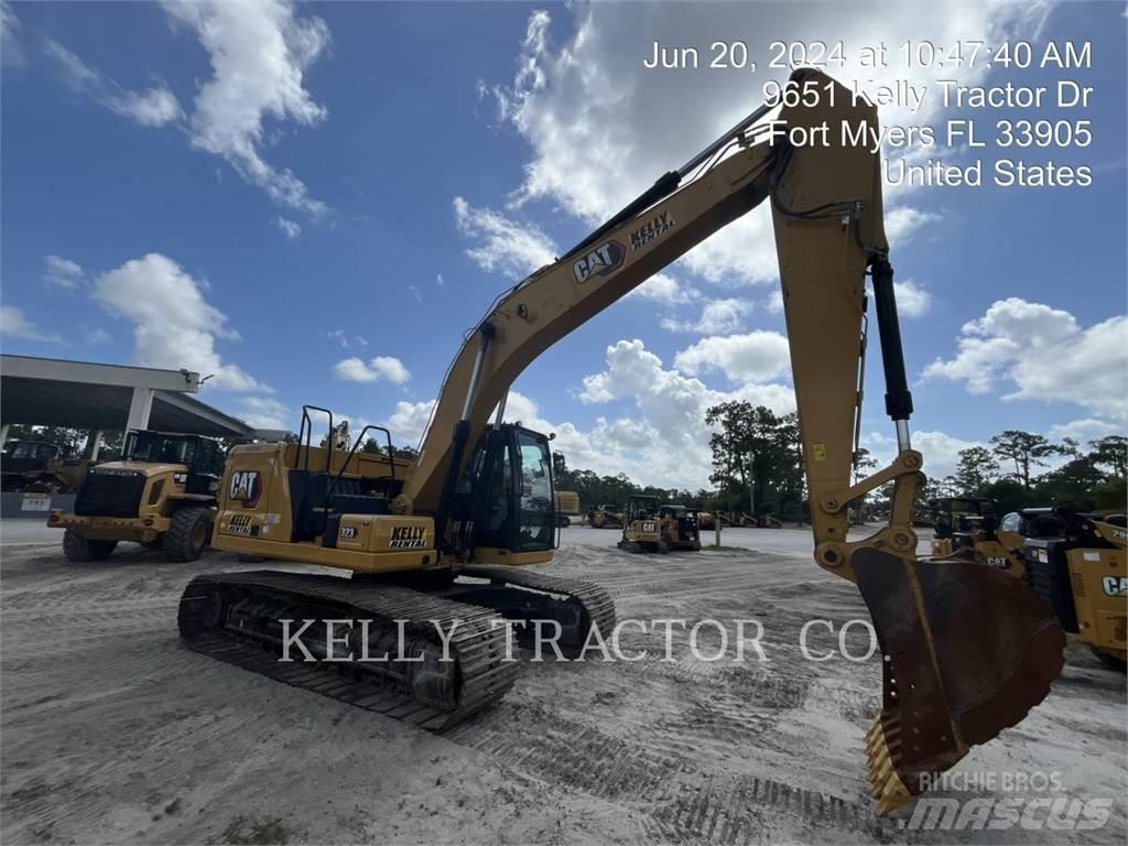 CAT 323 Rupsgraafmachines