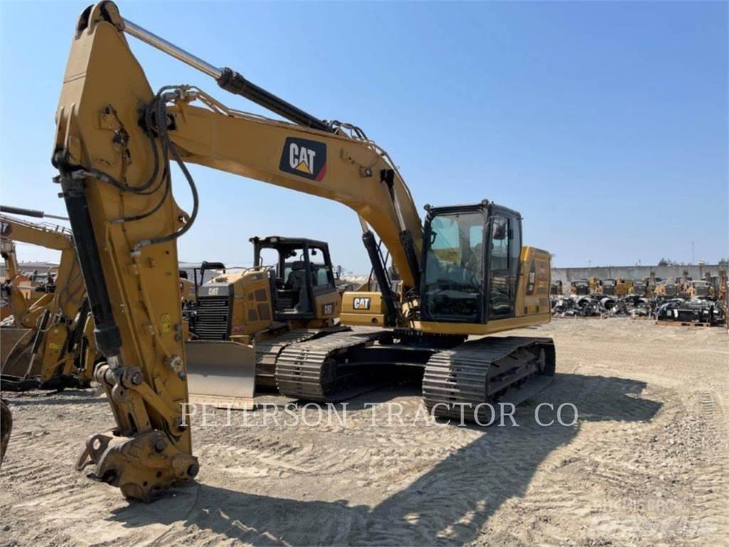 CAT 323 Rupsgraafmachines