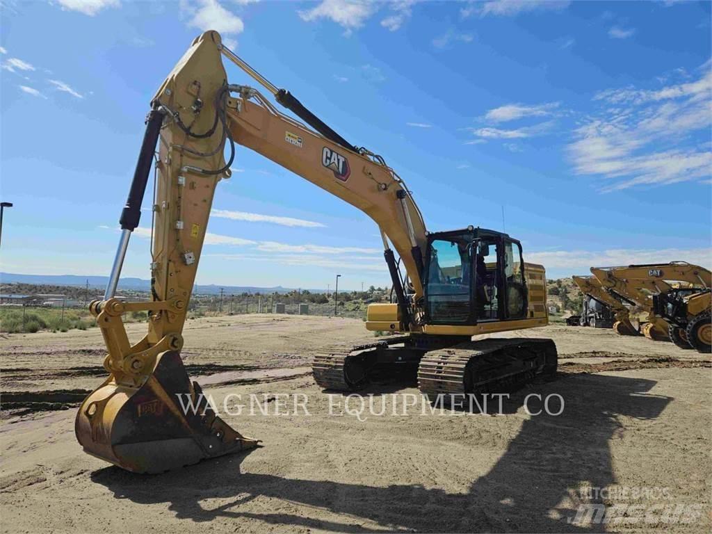 CAT 323 Rupsgraafmachines