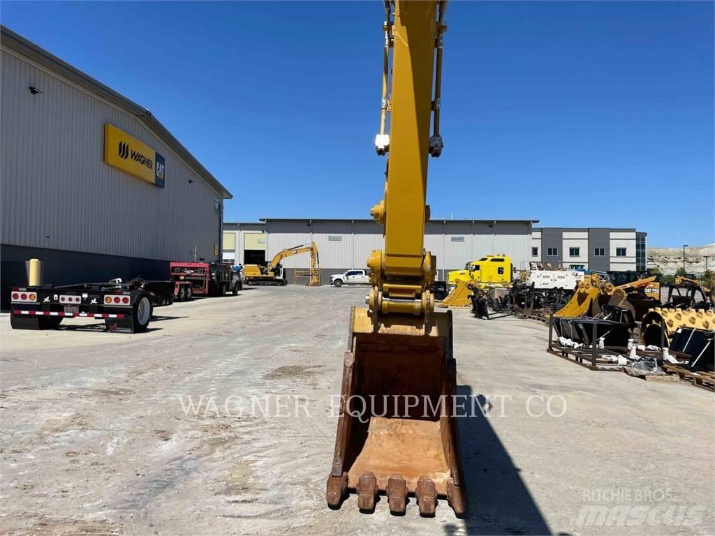 CAT 323 Rupsgraafmachines