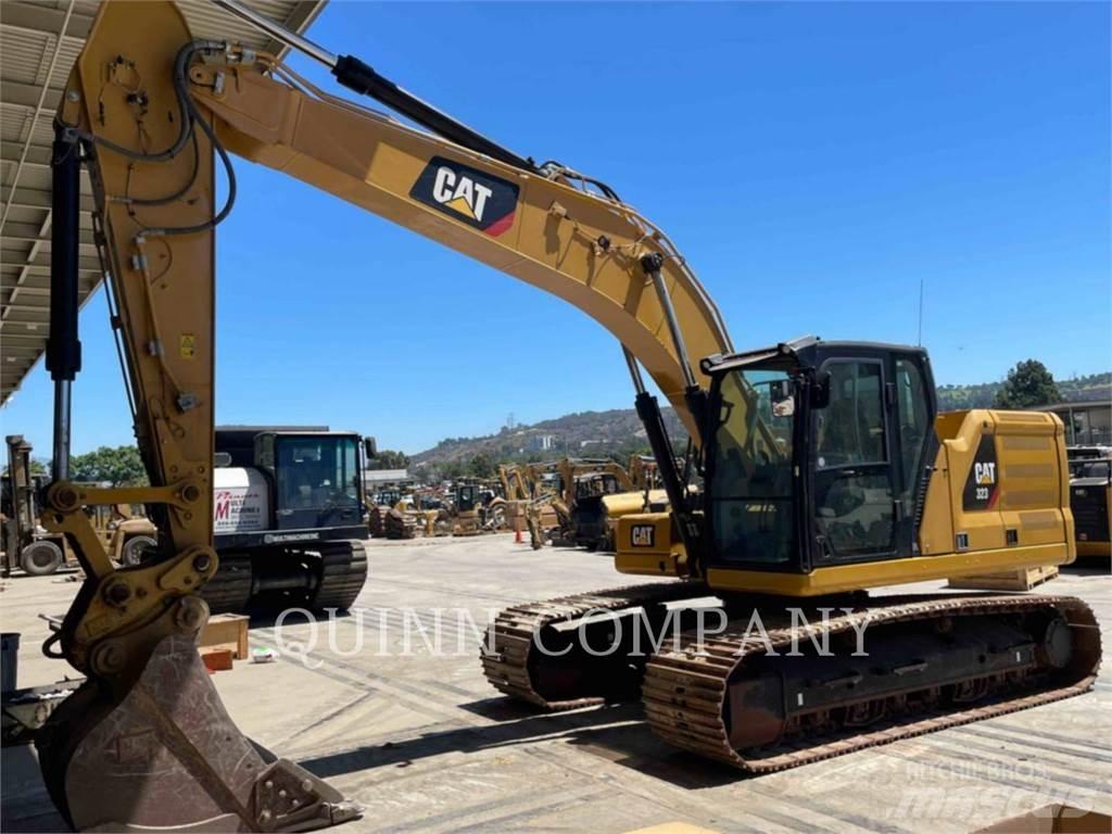 CAT 323 Rupsgraafmachines