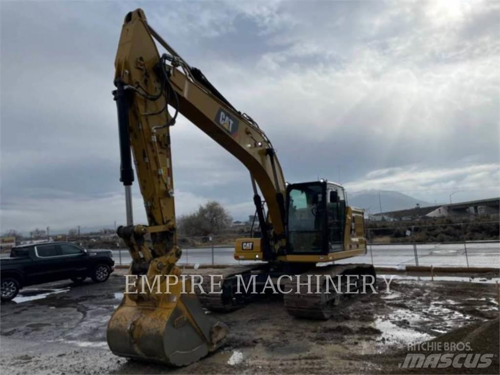 CAT 323 Rupsgraafmachines