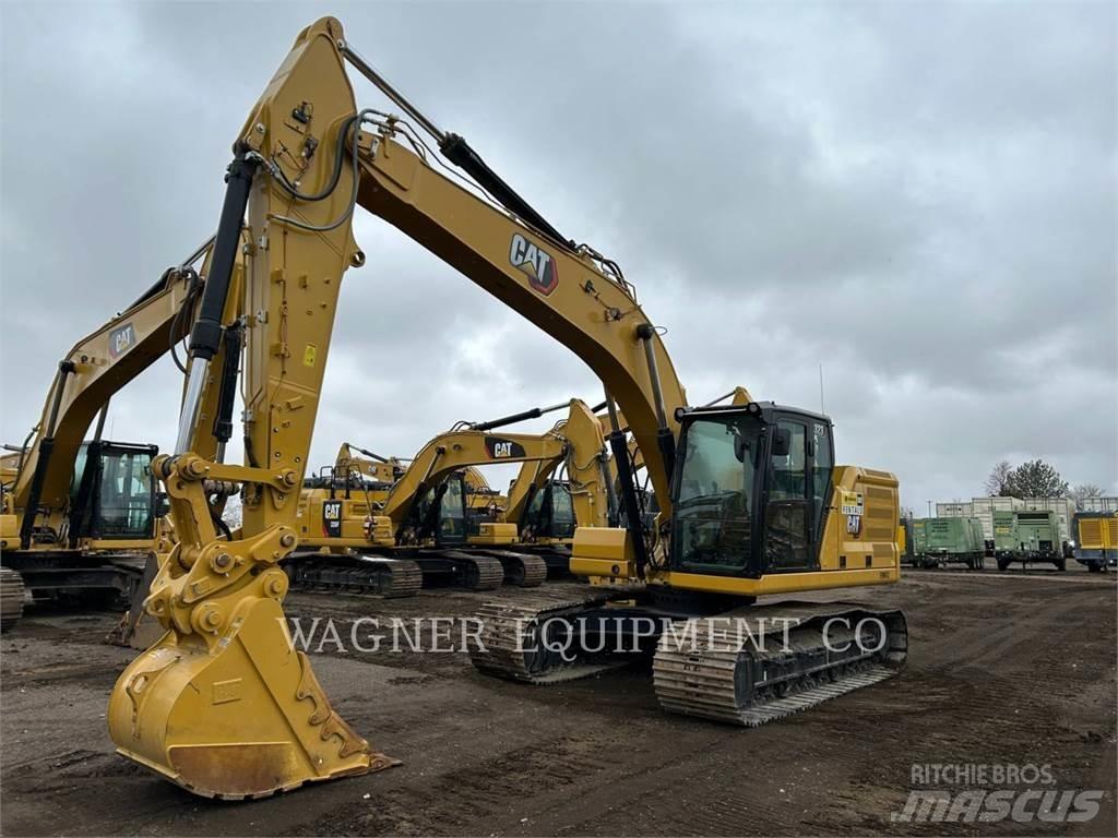 CAT 323 Rupsgraafmachines