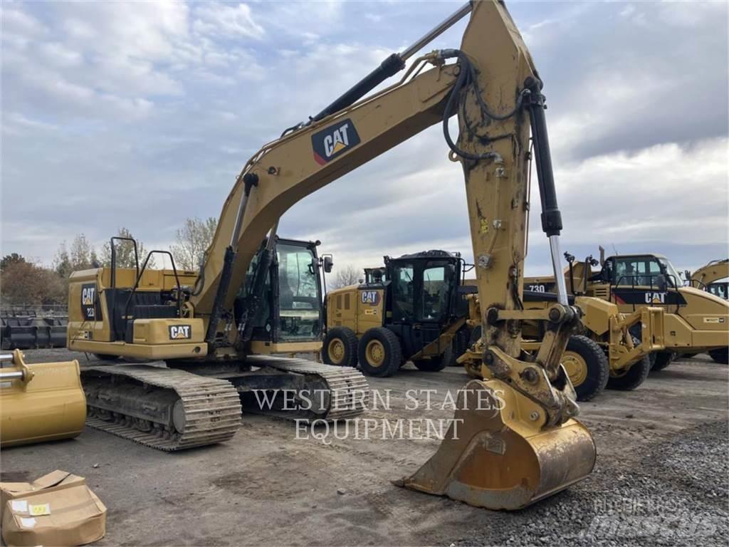 CAT 323 Rupsgraafmachines