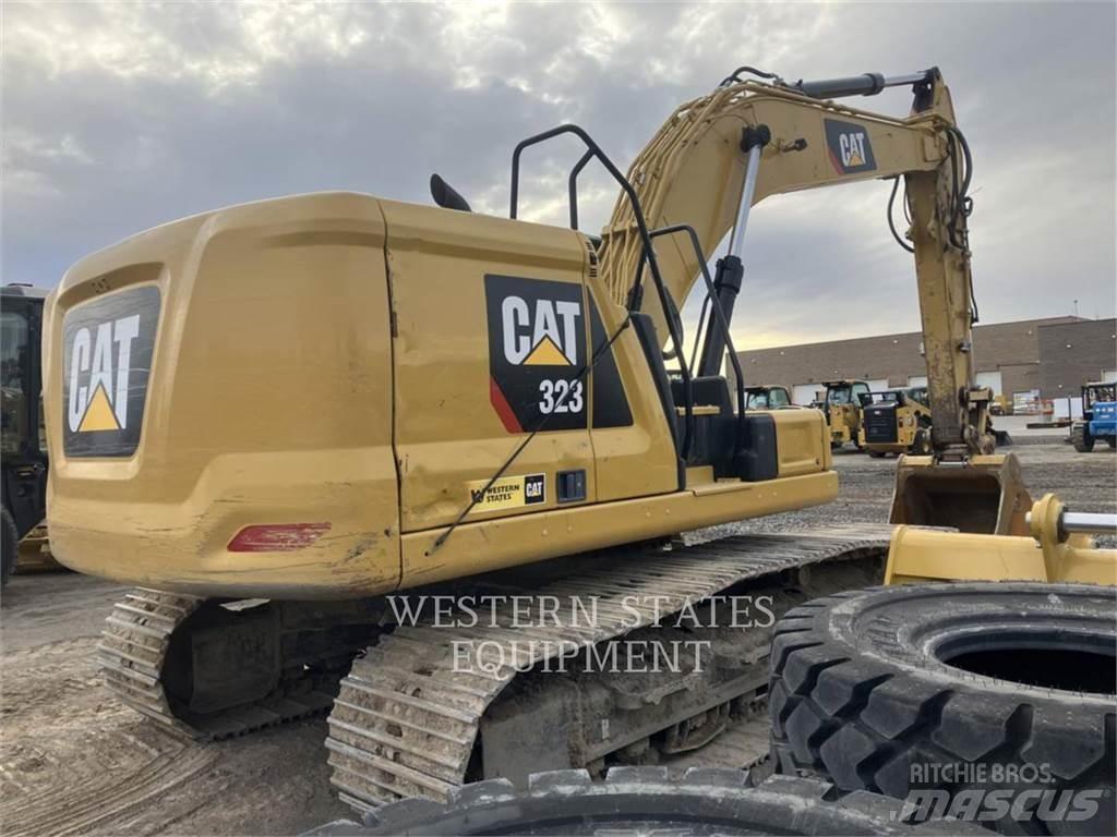 CAT 323 Rupsgraafmachines