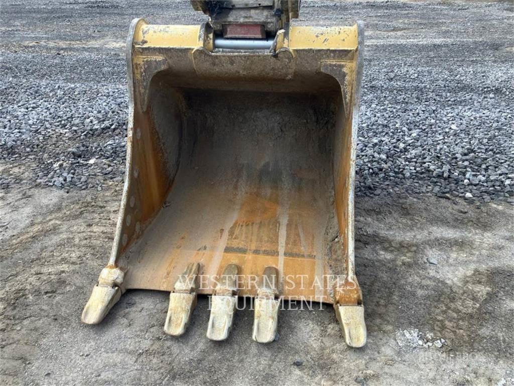 CAT 323 Rupsgraafmachines