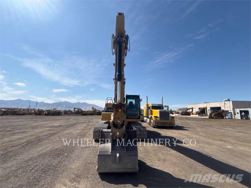 CAT 323 Rupsgraafmachines