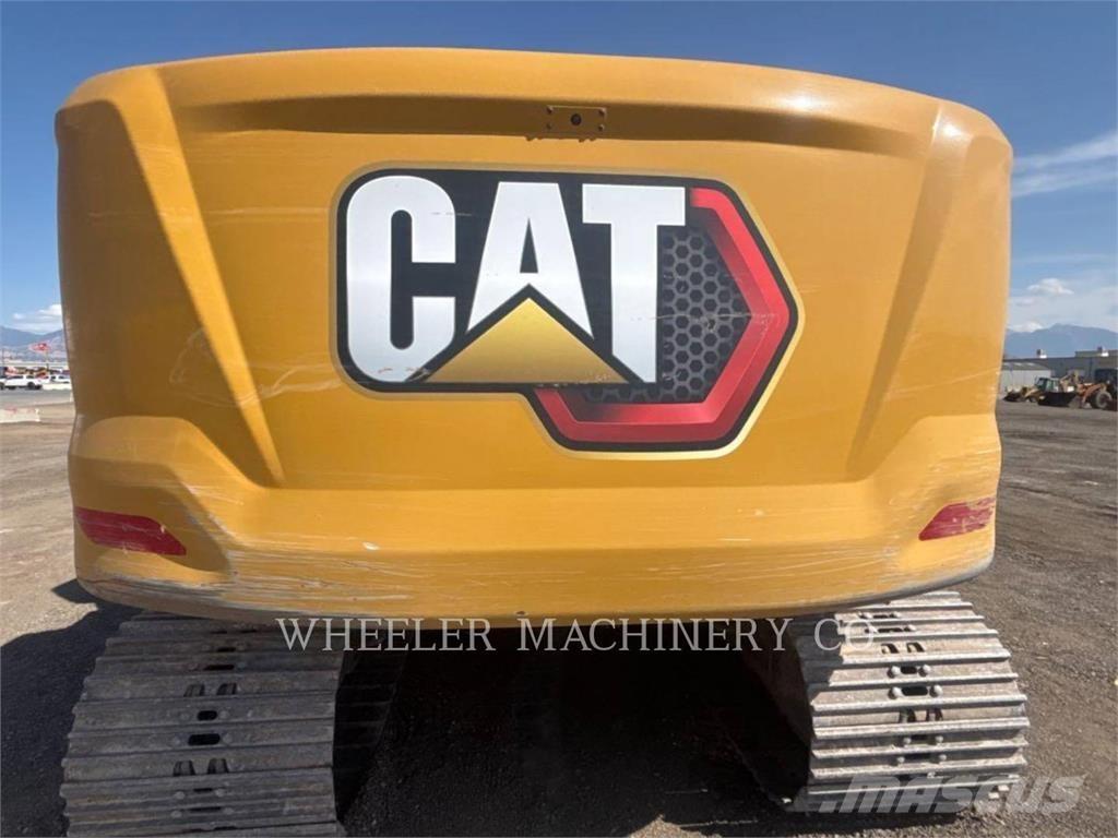 CAT 323 Rupsgraafmachines